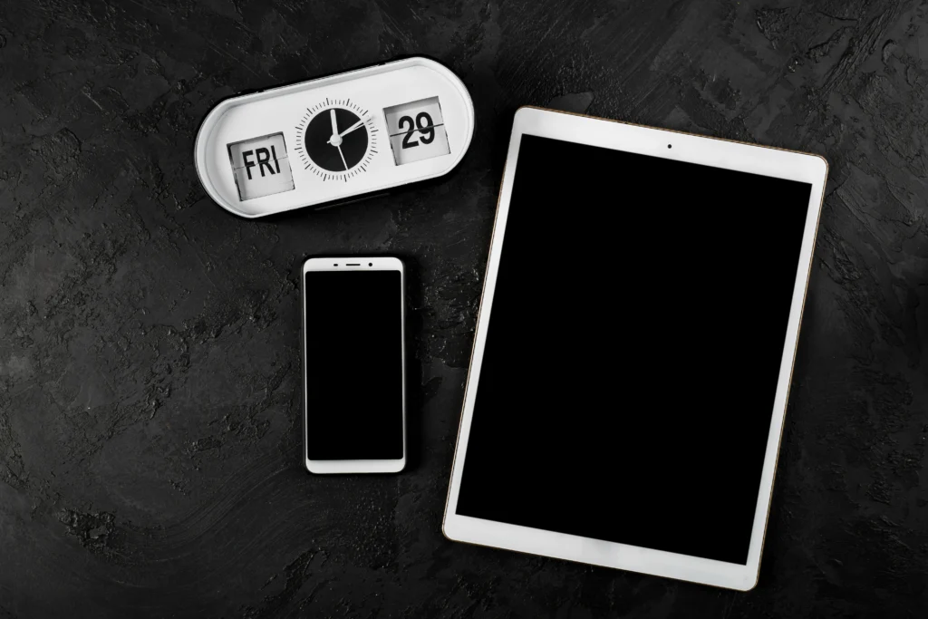 top-view-tablet-phone-plain-background